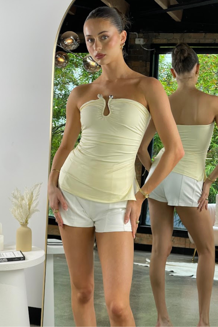 yellow strapless shirt